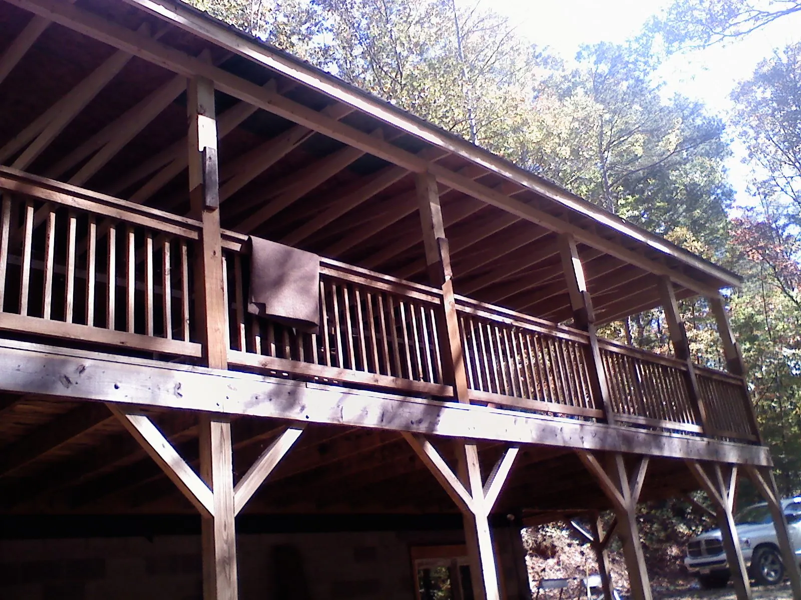 Timber framing under a new elevated porch and deck — Roof Leak Repair in Santo Domingo Pueblo by Roofing Brothers
